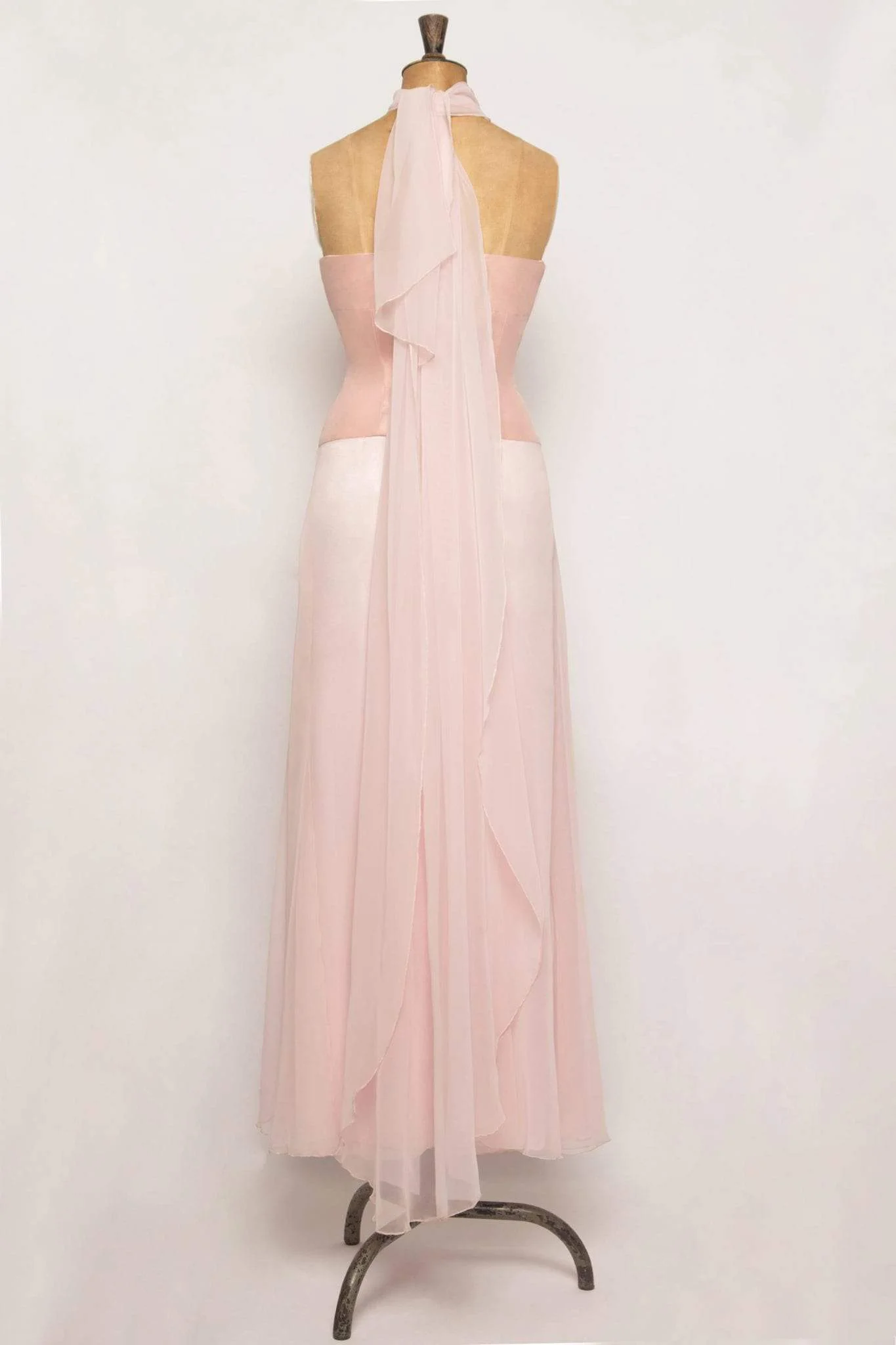 Pink chiffon bridal dress back view with flowing train detail