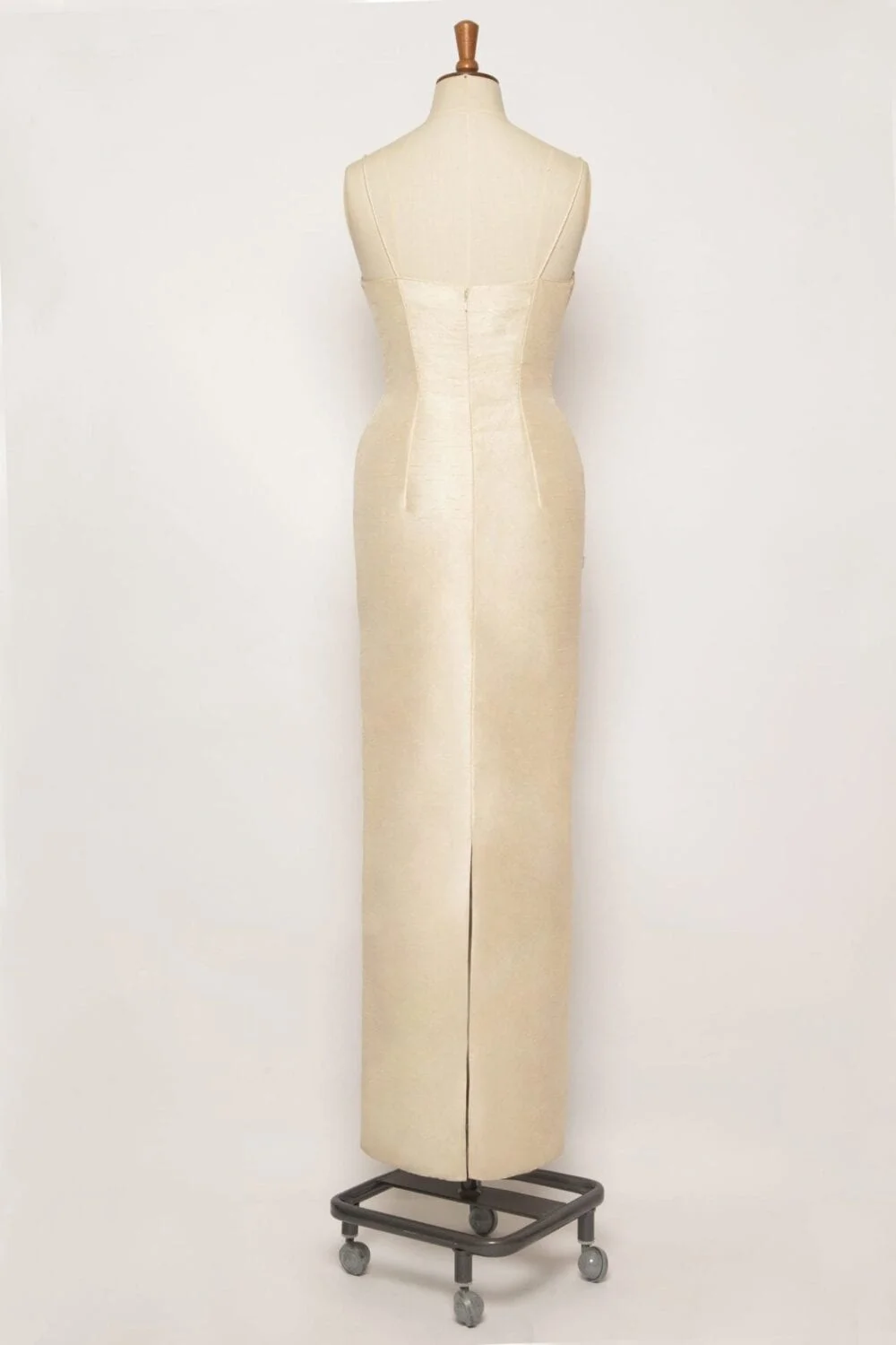 Elegant gold pure silk column dress with a square neckline, piped edges, spaghetti straps, and hand-sewn gold lace embroidery.