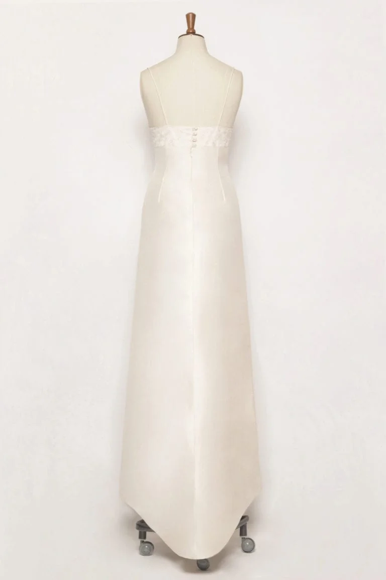 Edelweiss silk dupion wedding dress back view showing covered buttons and mini puddle train