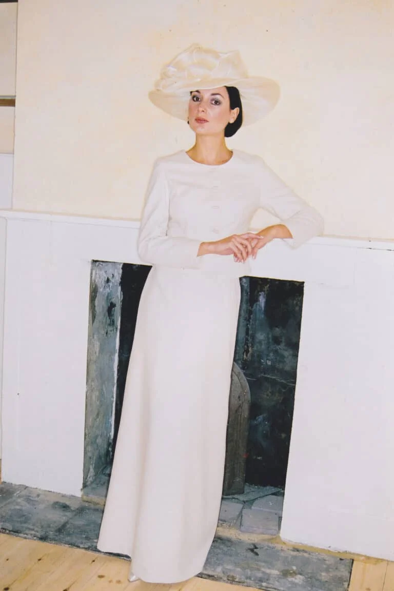 Classic two-piece ivory silk suit with a fitted short jacket and flowing A-line skirt in silk noil poplin